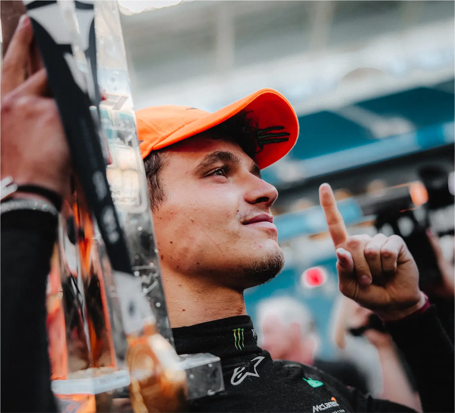 Lando lifting trophy